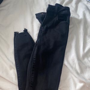 black ripped skinny jeans